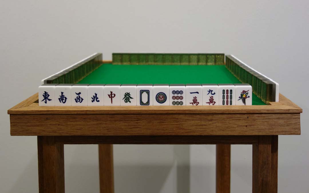 A custom-made table and mahjong tiles from It’s a Set Situation. 